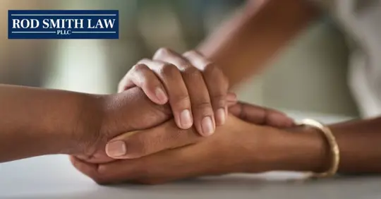 two people holding hands